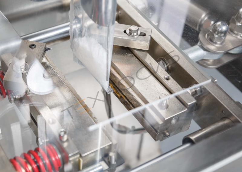 Автоматическая фасовочно-упаковочная машина DXDK-320RH-E (нерж., сашет 75*90 мм, 25-35 мл, W пленки 150 мм, датер в губках, насечка, зубч. нож.) Техно-Сиб - Купить с доставкой по всей России 17