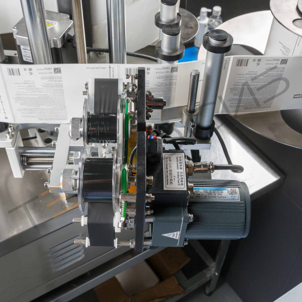 Автоматический этикетировщик для круглой тары с датером HLMT-130D Техно-Сиб - Купить с доставкой по всей России 26