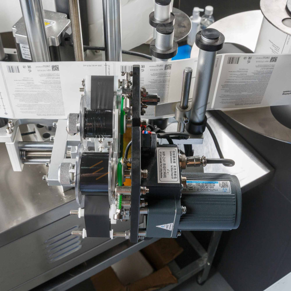 Автоматический этикетировщик для круглой тары с датером HLMT-130D Техно-Сиб - Купить с доставкой по всей России 26